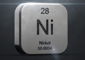 A metallic cube with shiny edges depicts the chemical element Nickel, with the symbol "Ni," atomic number 28, and atomic weight 58.6934 engraved on its front face. The background is dark, and the top left and bottom right corners are illuminated, reminiscent of fluctuating Nickel stocks in a dynamic market. | 5StarsStocks