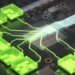 Close-up of a computer motherboard with a visible NVIDIA chip in the center. Glowing green digital lines and boxes are superimposed over the circuitry, symbolizing data flow and connectivity. The image evokes advanced technology and data processing, making one wonder, "Is NVIDIA a good stock to buy? | 5StarsStocks