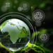 A glass globe depicting Africa rests on a bed of moss, surrounded by nature-themed icons including recycling, renewable energy, and sustainable practices, symbolizing environmental conservation and socially responsible investing in a lush, green environment. | 5StarsStocks