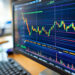 A computer monitor displays a colorful financial chart with multiple lines and bars, representing fluctuating stock prices from 5StarsStocks .com Stock Market. The chart is situated in a work environment, with parts of a keyboard and mouse visible in the background. | 5StarsStocks