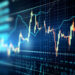 An abstract image of a financial stock market graph showing fluctuating lines, bars, and grid overlay. The chart features various peaks and troughs, indicating market volatility, with a glowing blue and orange color scheme on a dark background. | 5StarsStocks