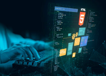A person types on a keyboard with a digital overlay showing HTML5 icons, code snippets, and web development graphics, symbolizing tech programming and web design. The scene has a blue-green tech-inspired theme. | 5StarsStocks