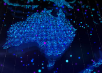 A digital map of Australia composed of small blue dots, with scattered glowing dots in blue, purple, and white. The background is dark, giving a futuristic, high-tech appearance. | 5StarsStocks