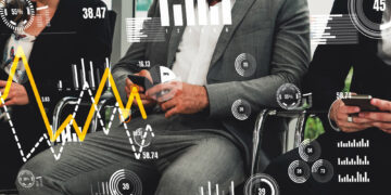 Three people in business attire sit side by side looking at their phones, overlaid with various data visualizations such as graphs, charts, and numerical statistics. | 5StarsStocks